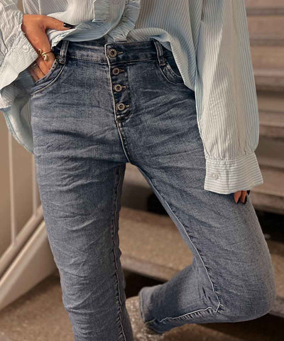jeans med knappgylf closeup