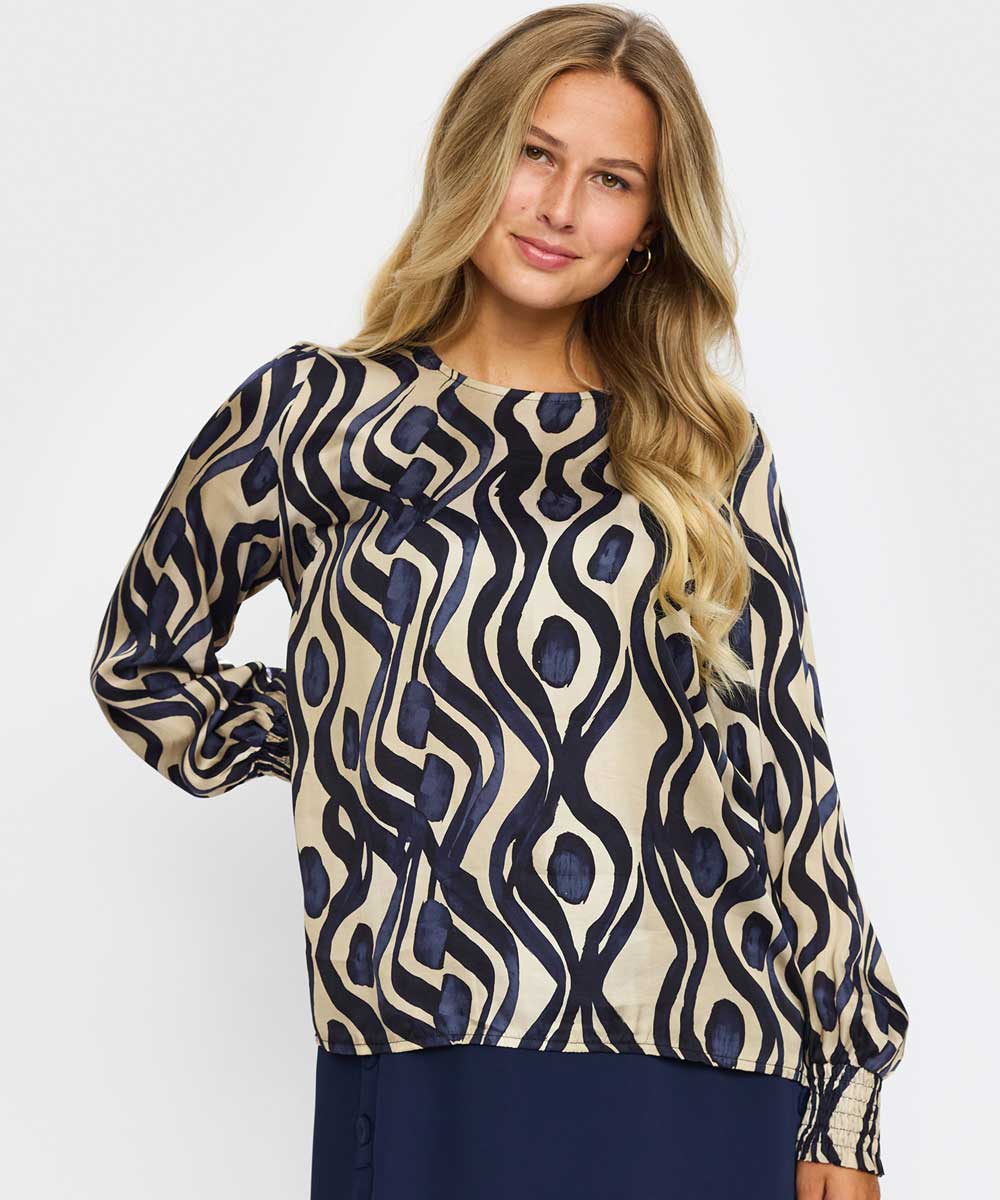 Blus med blått mönster