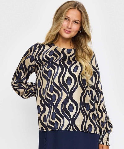 Blus med blått mönster