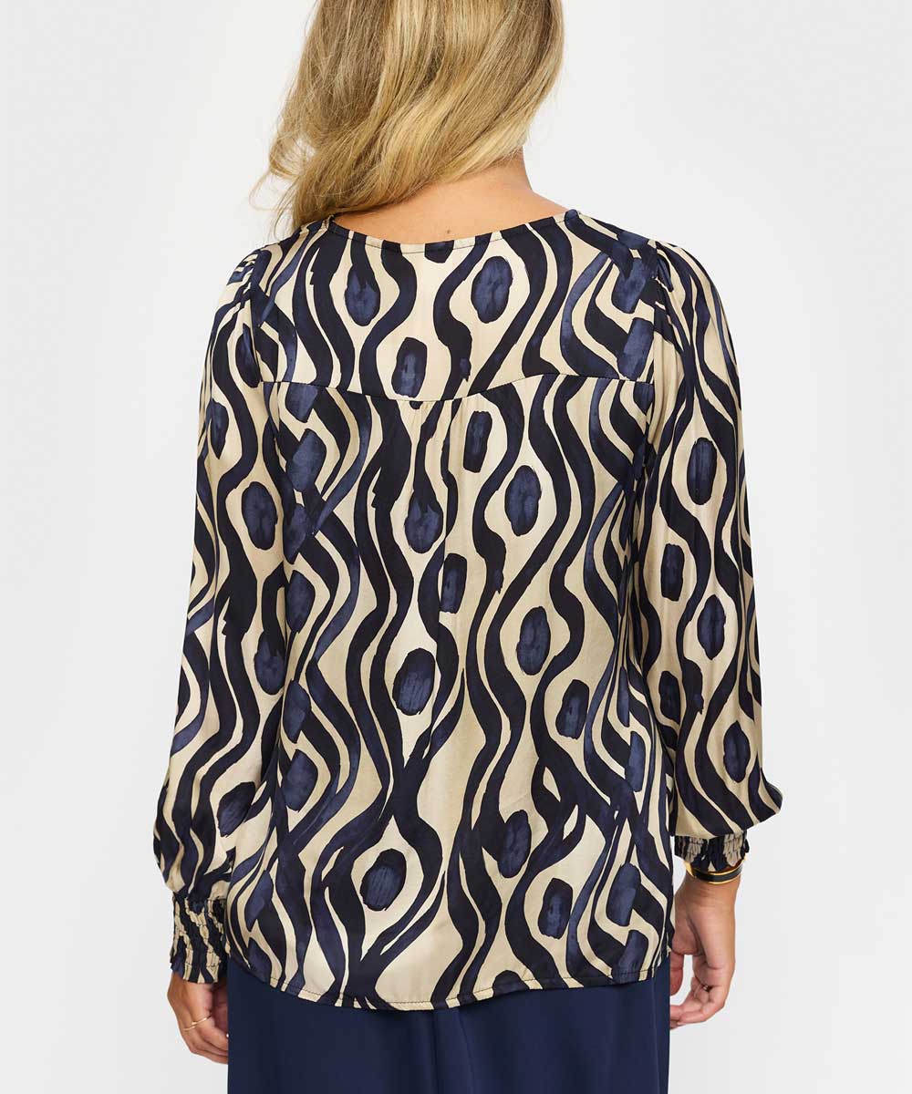 Blus med blått mönster baksida