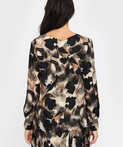 Svart mönstrad blus baksida