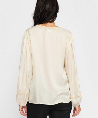 Sandfärgad blus baksida