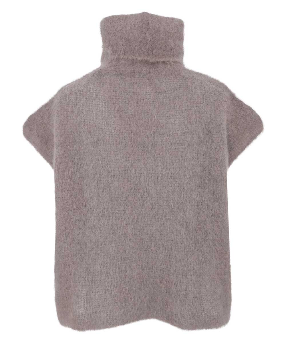 poloväst i beige baksida