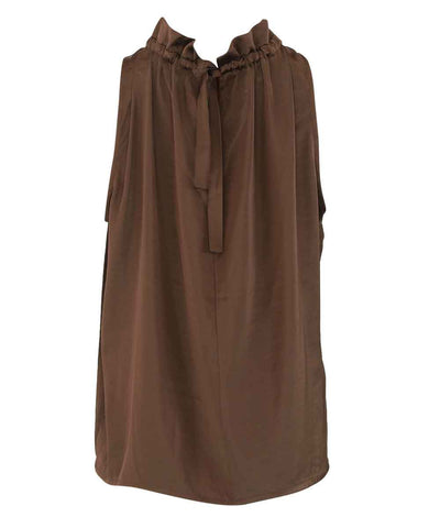 brun blus baksida