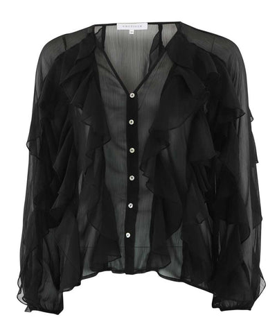 svart blus med volanger
