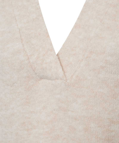 beige tröja detaljer