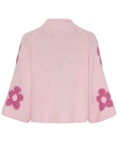 rosa stickad tröja med blommor