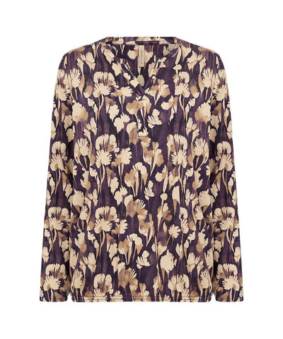 Blus med lila mönster