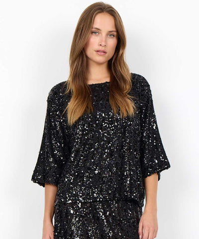 svart blus med paljetter