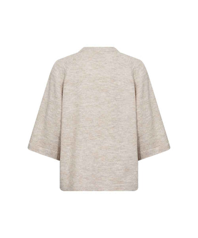 Beige stickad tröja baksida