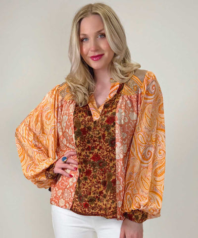 Orange blus