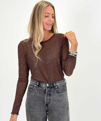 Modell i topp med glitter