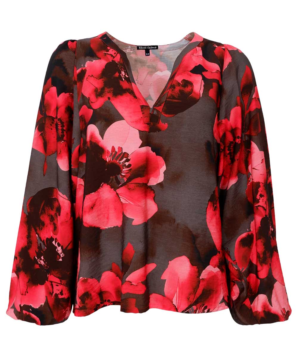 Blus med röda blommor