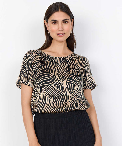 blus i svart och beige