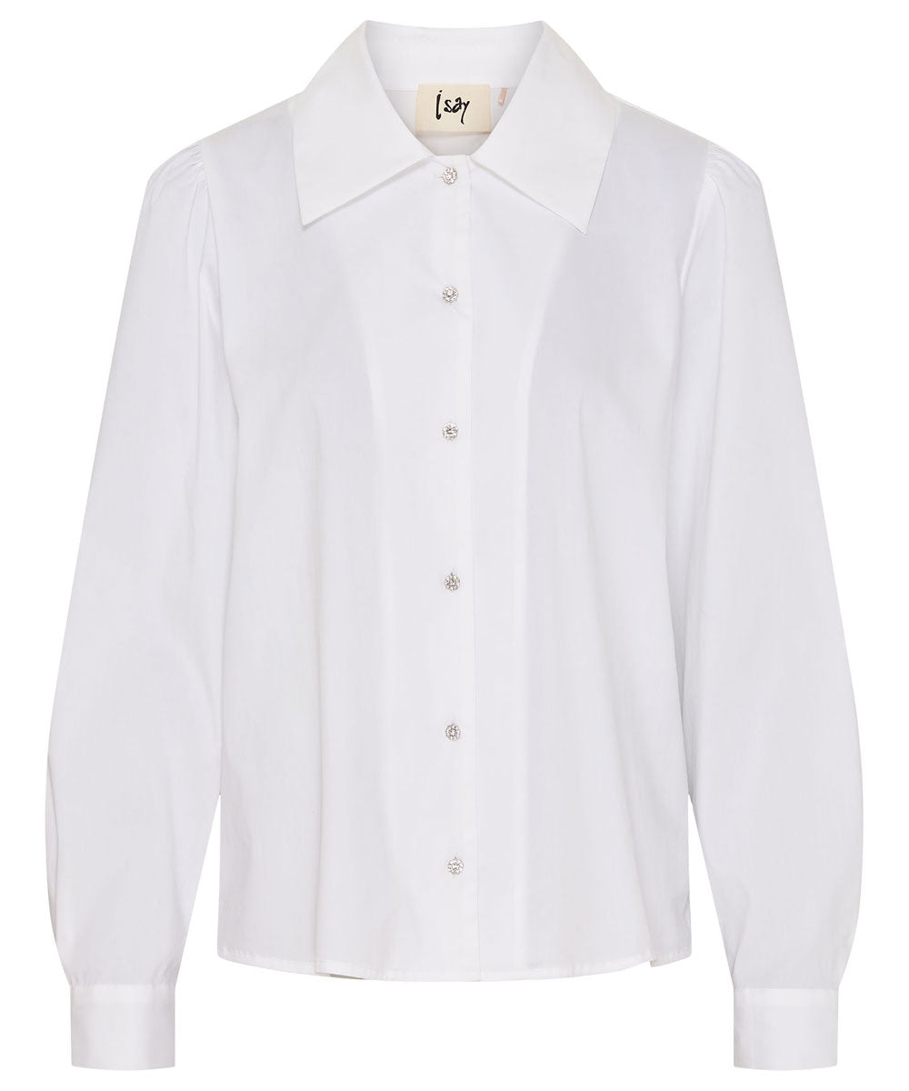 vit skjorta med glittriga knappar