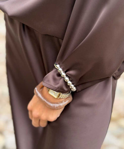 detaljer brun blus