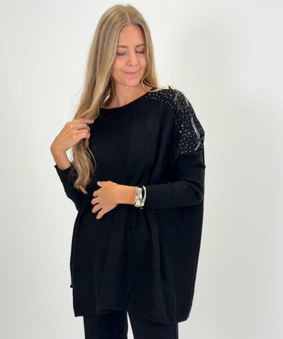 tröja med glitter på axlarna