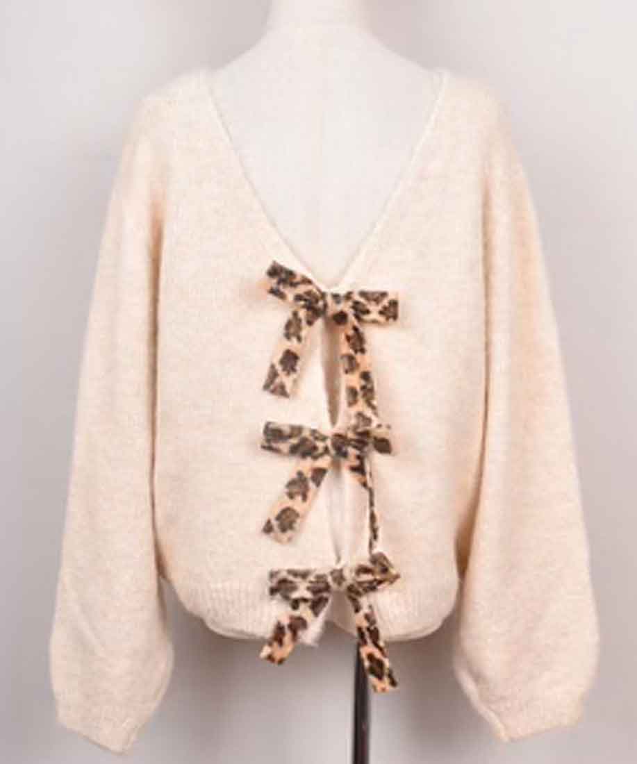 Beige cardigan med rosett