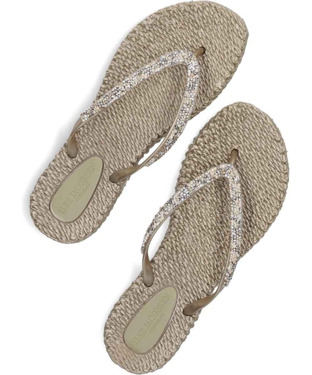 beige flipflop med glitterstenar