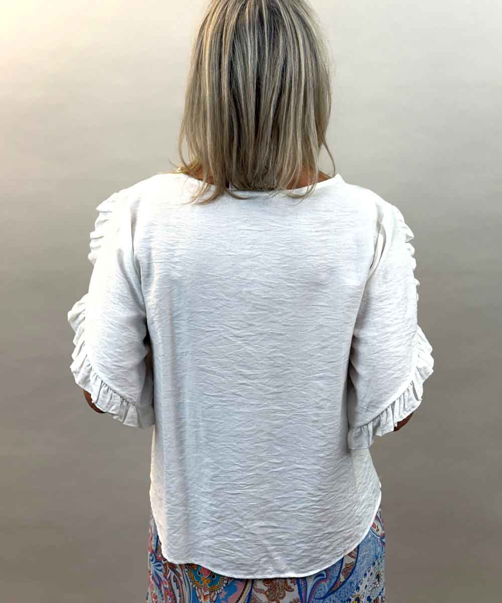 vit blus baksida