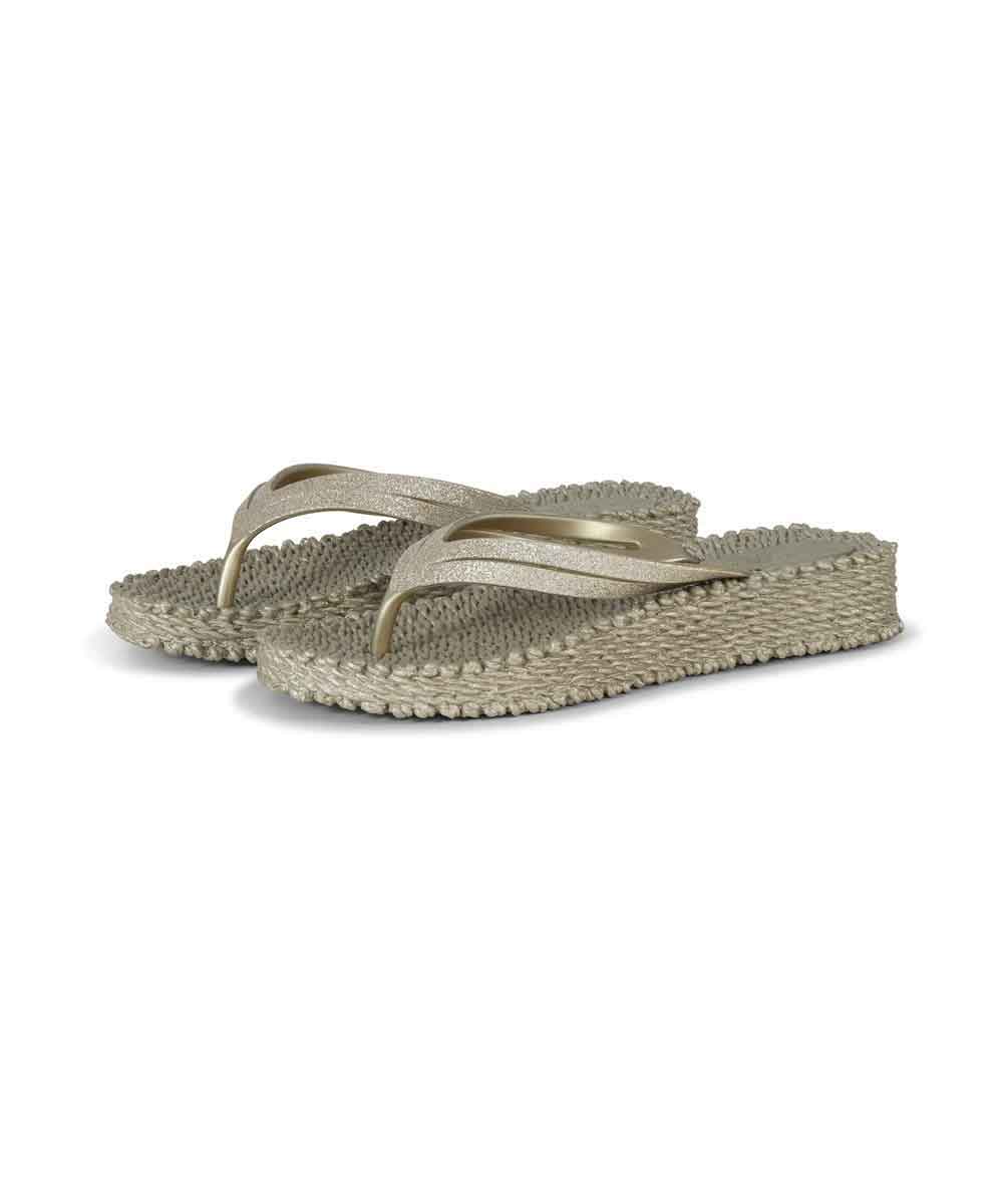 flip flops med guldiga remmar