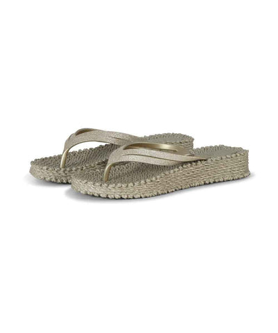 flip flops med guldiga remmar