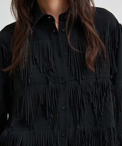 detaljer blus med fransar