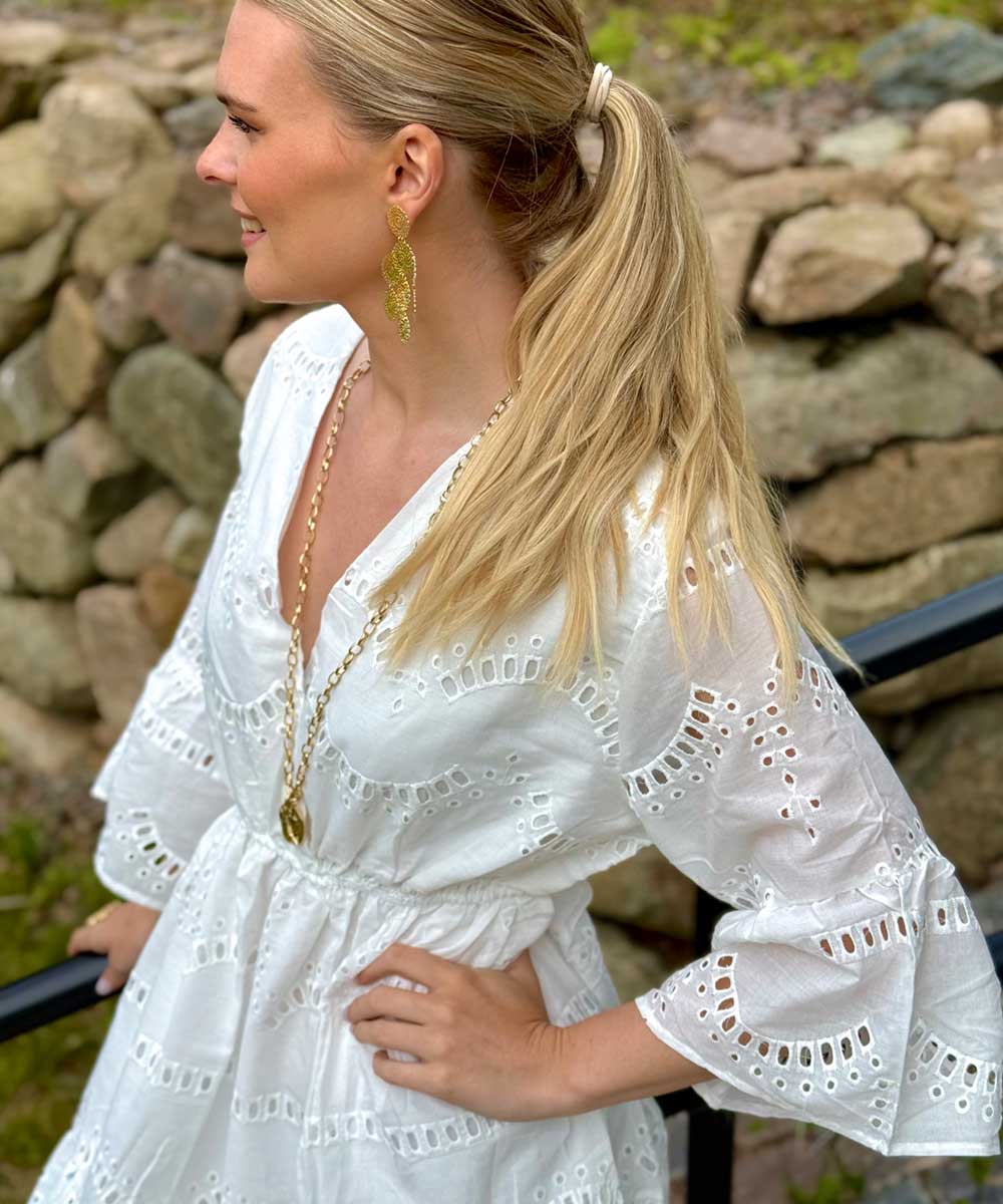 detaljer vit tunika