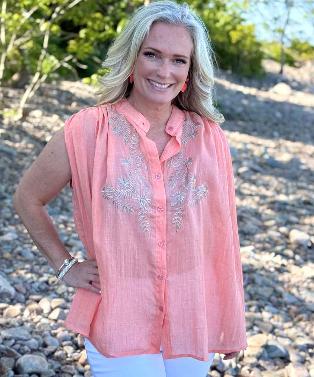Blus i korallfärg