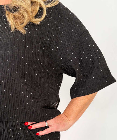detaljer svart glitter topp