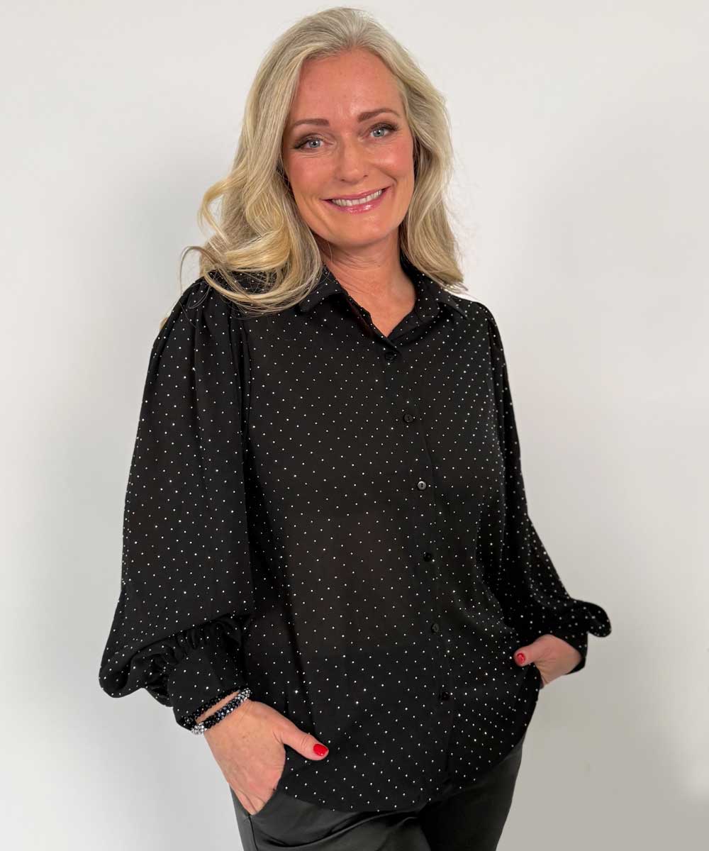 Glittra blus i svart