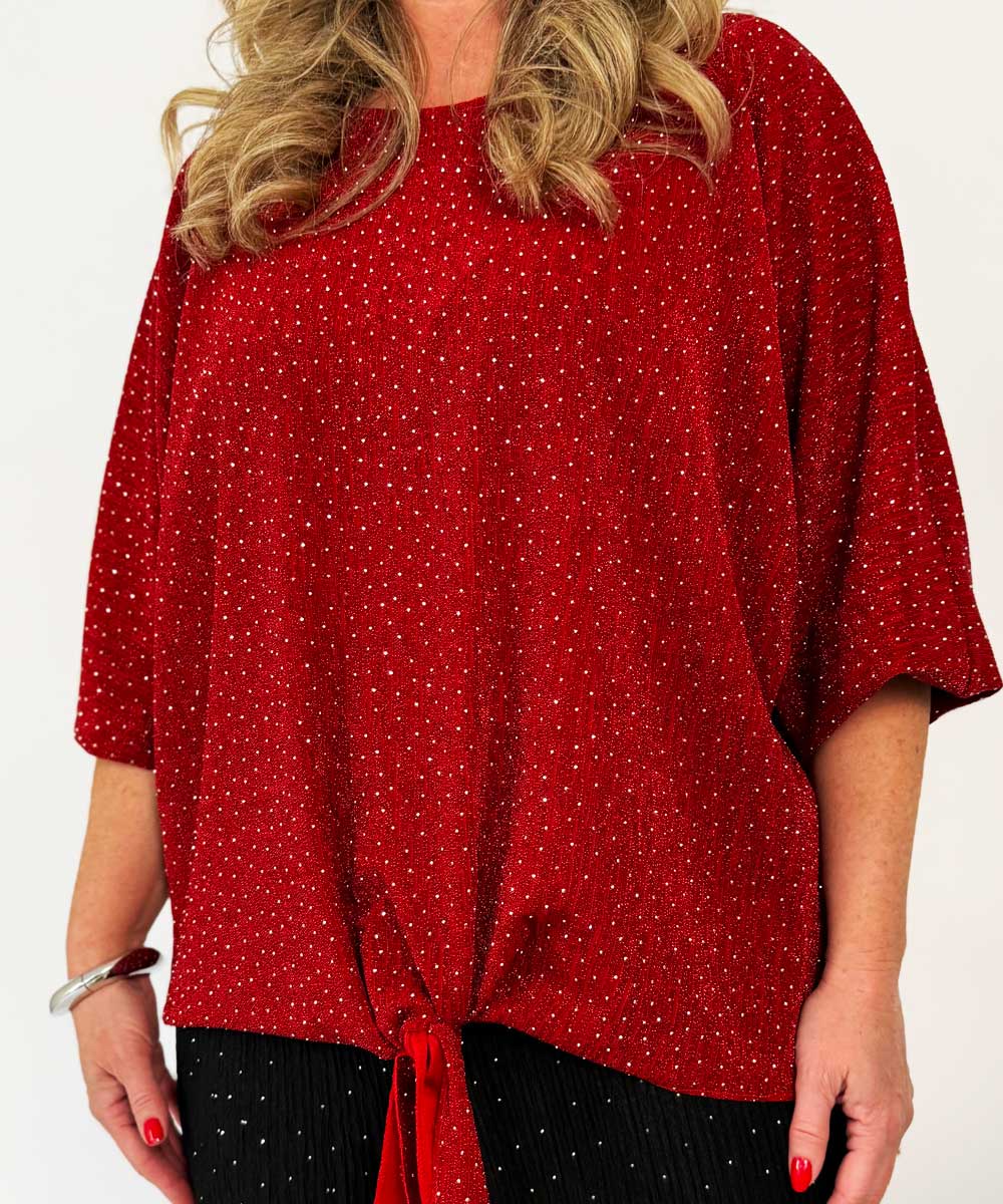 detaljer röd glittertopp