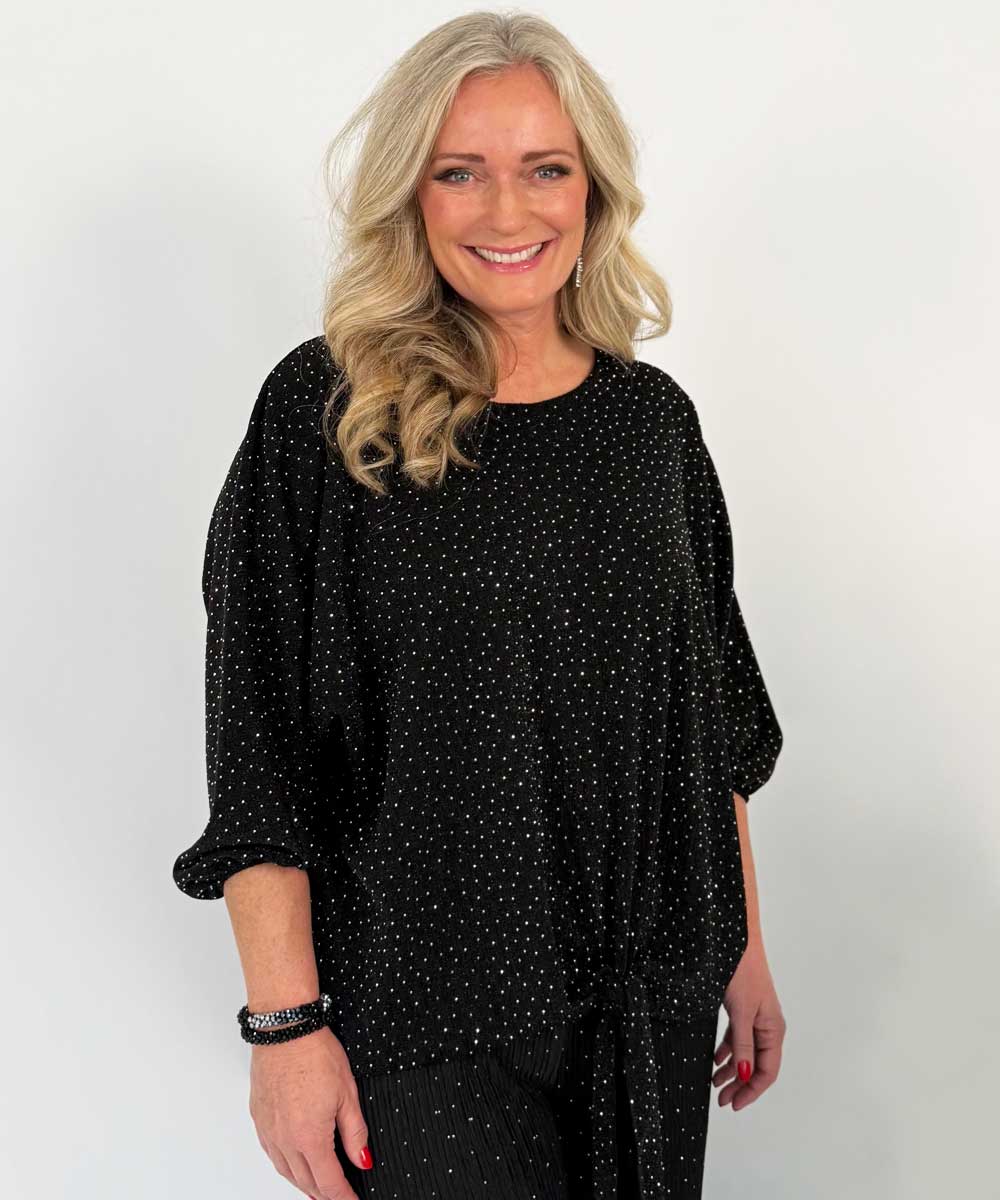 svart topp med knyt nertill