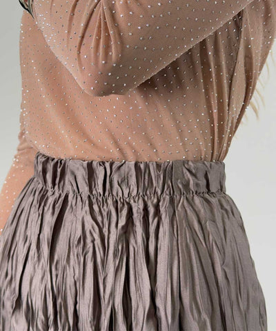 detaljer brun kjol