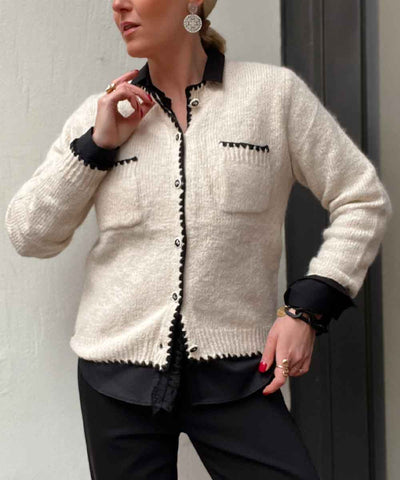 Beige cardigan med svarta sömmar