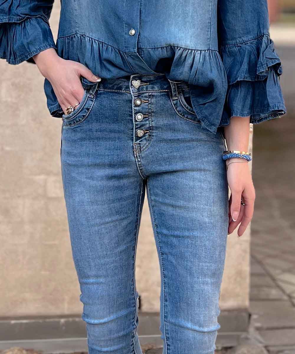 Jeans med glitterknappar