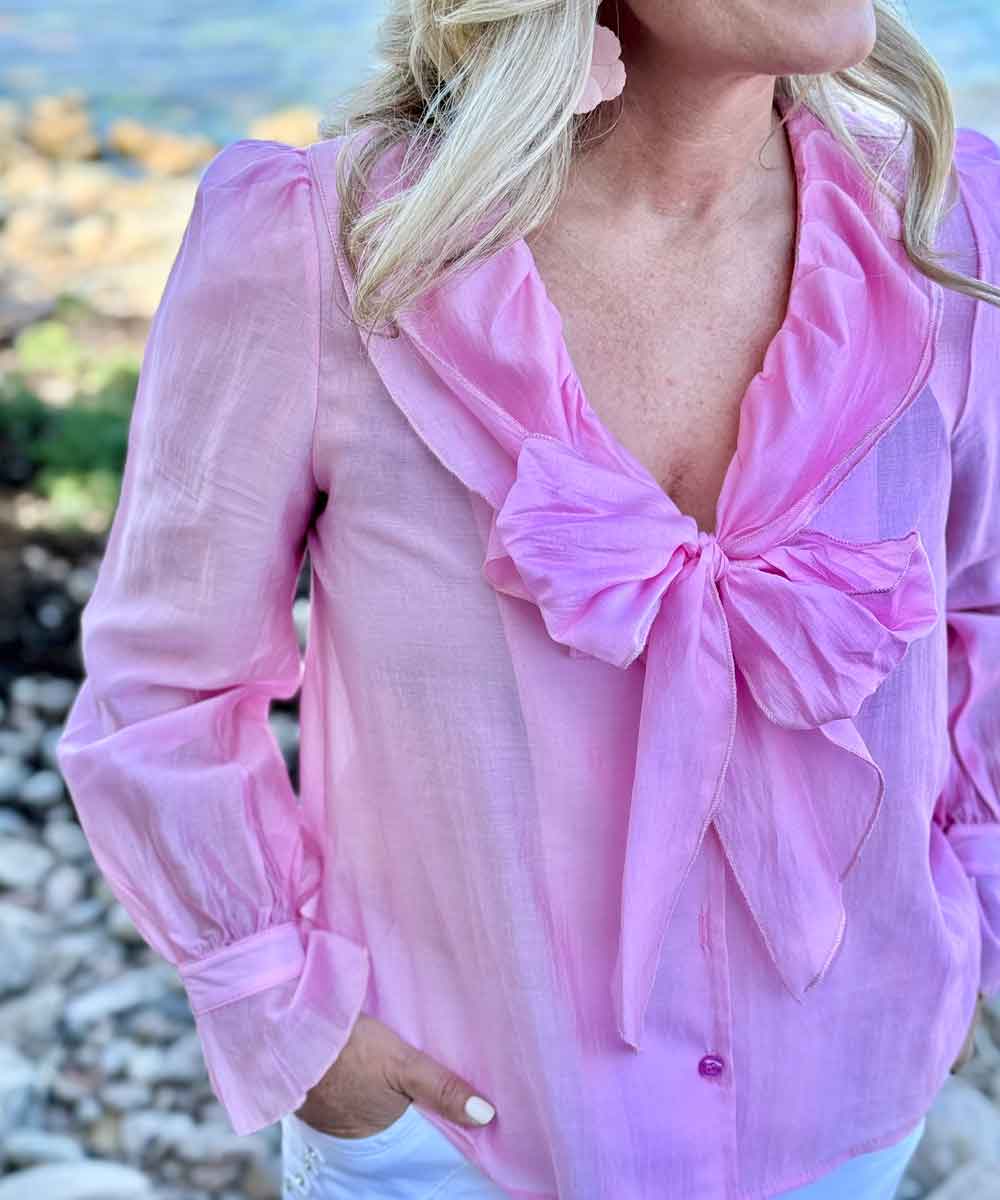 blus med rosett i rosa