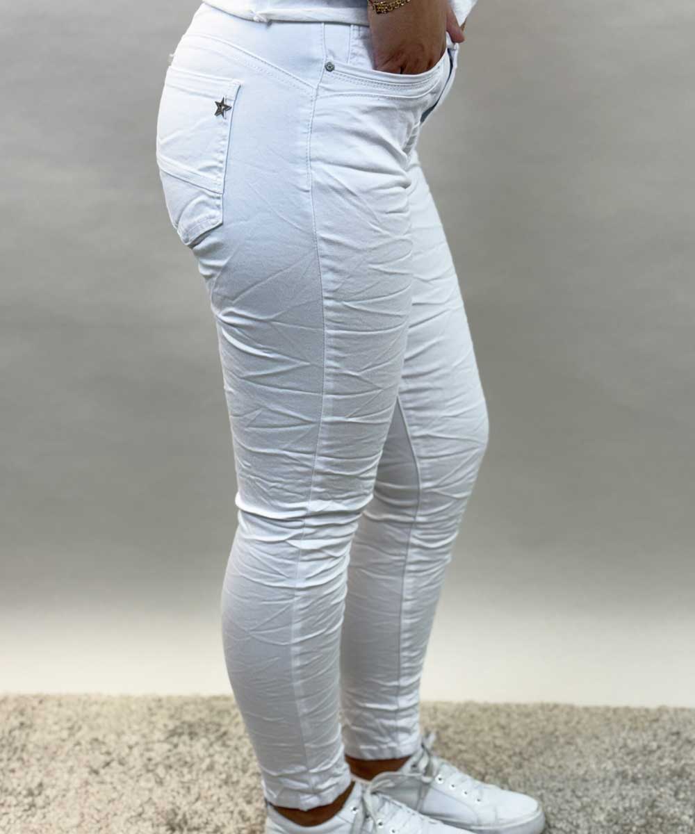 vit jeans från sidan