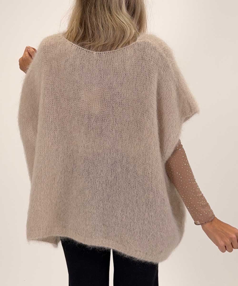 beige väst baksida