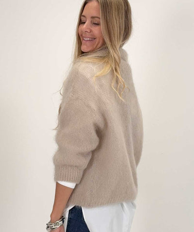 beige tröja baksida