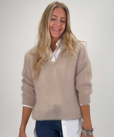Beige tröja med krage