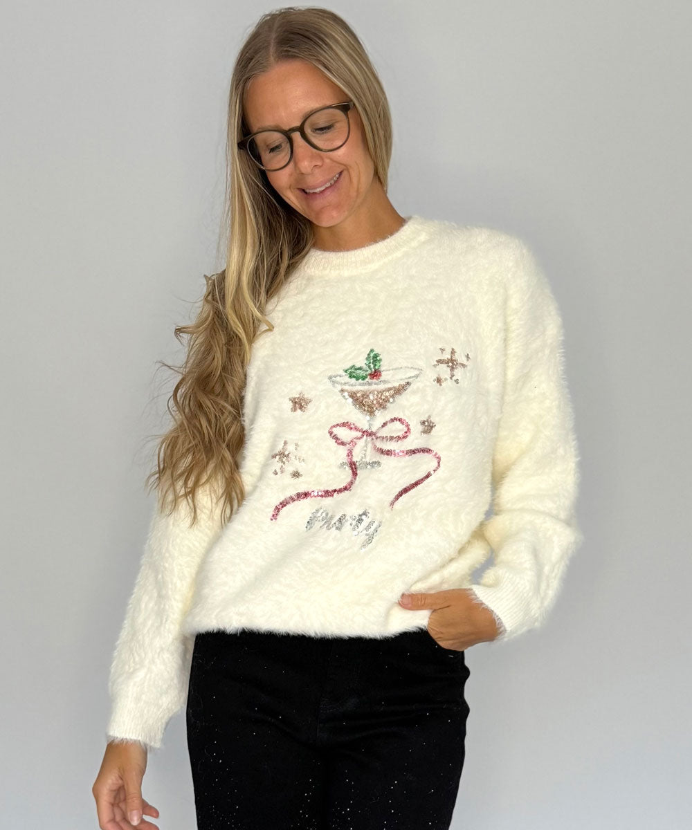 Stickad tröja med glitter