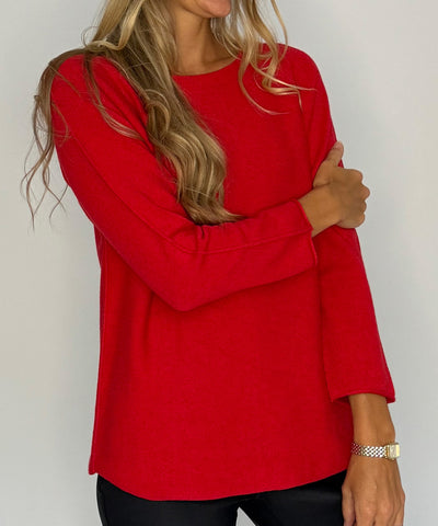 röd tröja detaljer