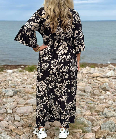 svart klänning baksida