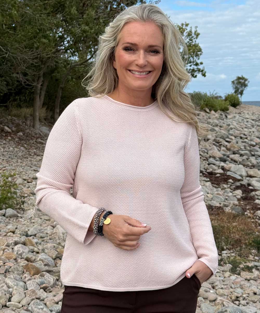 Rosa stickad tröja