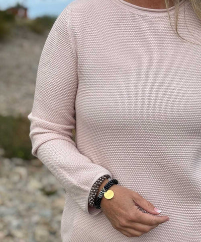 detaljer rosa tröja