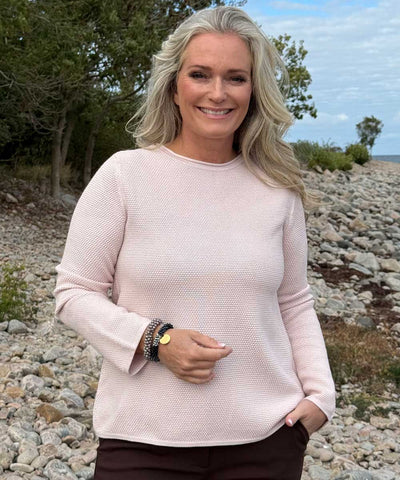 Rosa stickad tröja