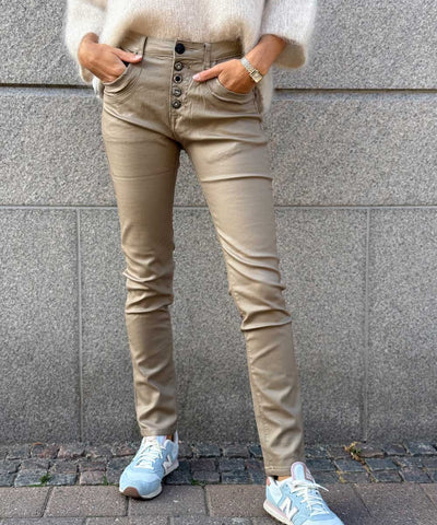 beige vaxad byxa