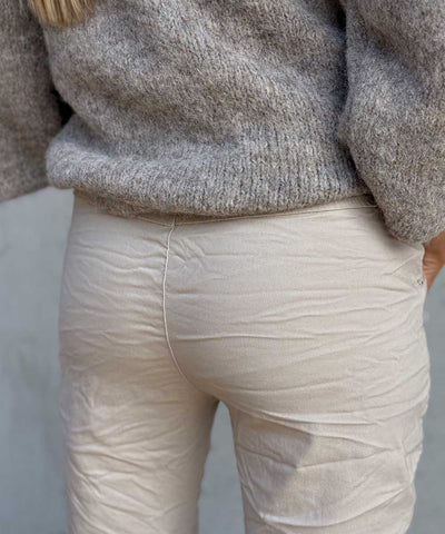 beige byxa bak