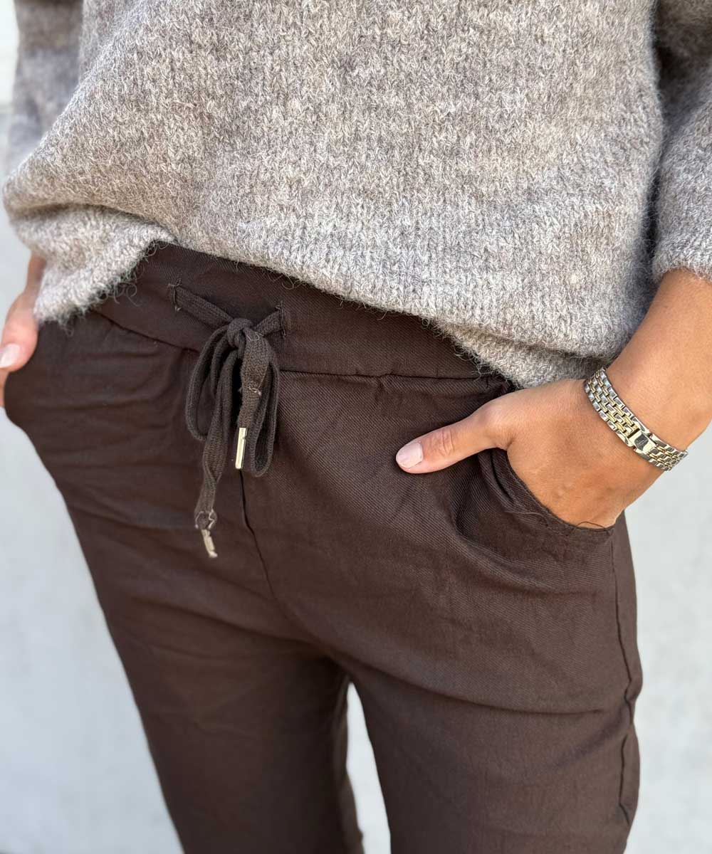 detaljer brun byxa